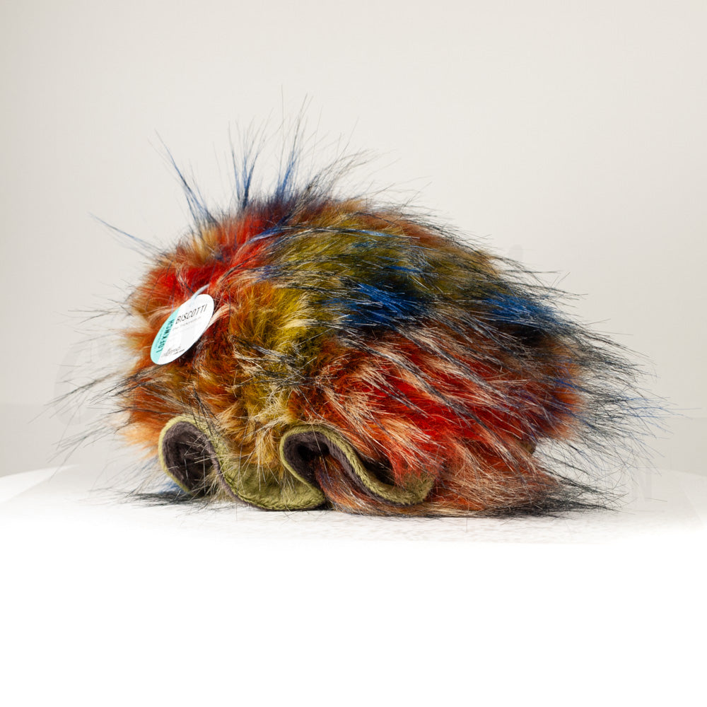 Slightly angled back view of a cuttlepod plush toy, highlighting two-tone ruffled fins, and a cuddly, furry body that comes to a soft point at the rear.