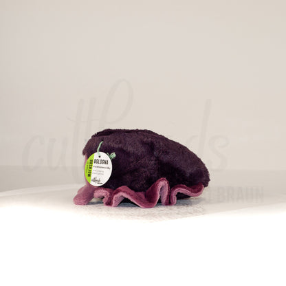 Side profile view of a cuttlepod plush toy, showcasing two-tone ruffled fins, and a cuddly, furry body.